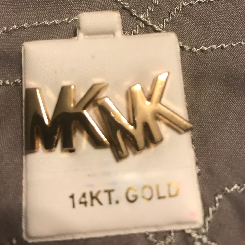 Michael Kors Gold post earrings.